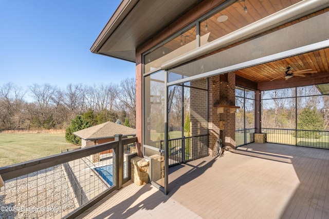 wooden terrace with ceiling fan