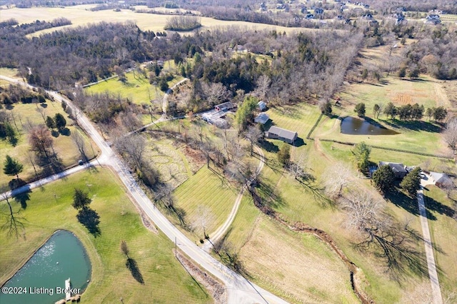 aerial view featuring a rural view and a water view