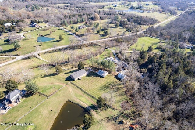 aerial view with a rural view and a water view