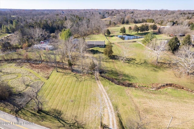 aerial view featuring a rural view and a water view