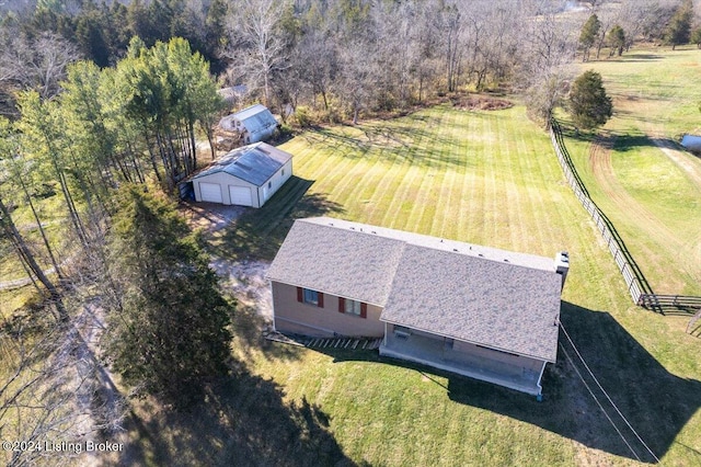 birds eye view of property featuring a rural view