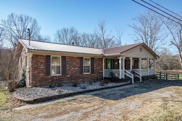 ranch-style home with a porch