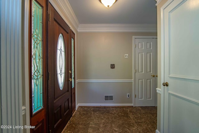 foyer entrance featuring ornamental molding