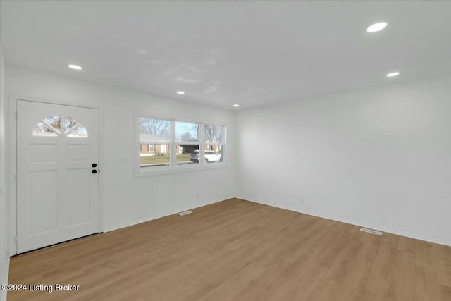 entrance foyer with light hardwood / wood-style floors