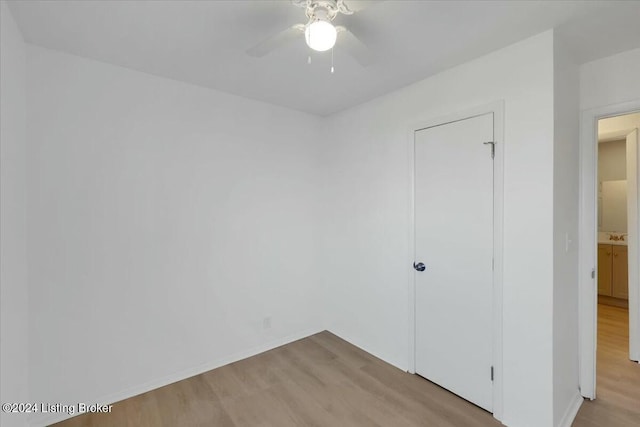 unfurnished bedroom featuring light wood-type flooring and ceiling fan