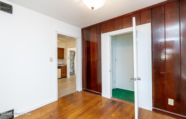 hallway featuring hardwood / wood-style floors