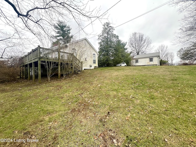 view of yard featuring a wooden deck