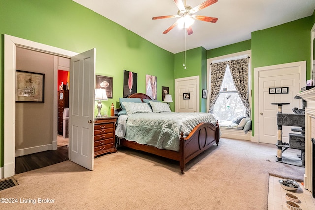 bedroom featuring carpet and ceiling fan