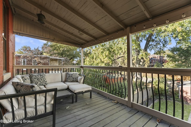 wooden deck with an outdoor hangout area