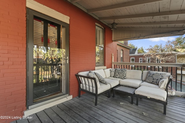 deck with an outdoor hangout area