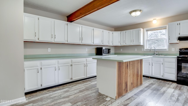 kitchen featuring white cabinetry, sink, electric range, and light hardwood / wood-style flooring