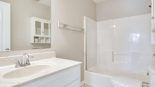 full bathroom featuring vanity, toilet, and shower / washtub combination