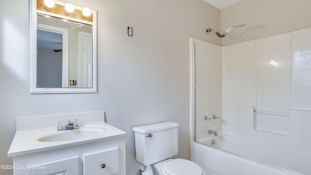 full bathroom featuring vanity, toilet, and shower / washtub combination