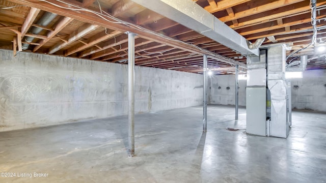 basement featuring heating unit