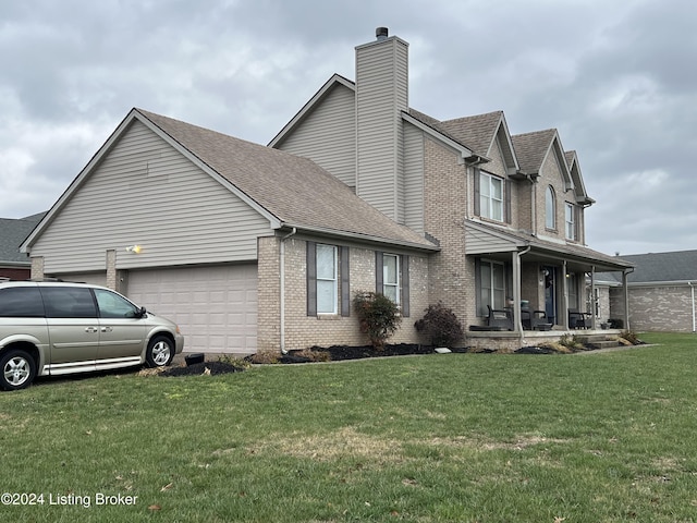 view of side of home with a yard, a porch, and a garage