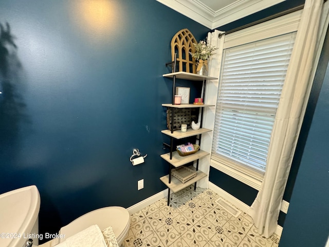 bathroom featuring tile patterned floors and ornamental molding