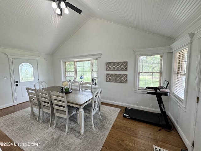 dining space with dark hardwood / wood-style floors, ceiling fan, plenty of natural light, and lofted ceiling