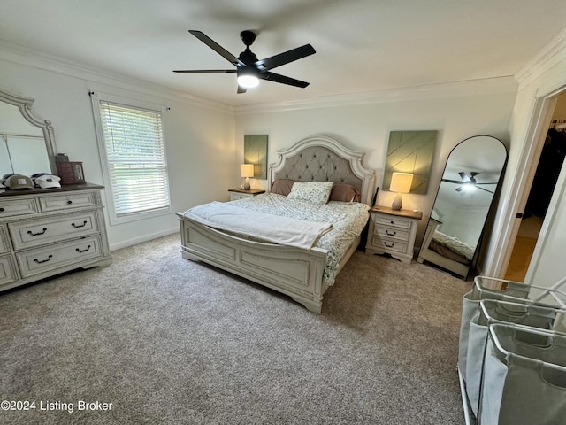 bedroom with ceiling fan, crown molding, and light colored carpet