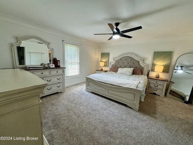 bedroom featuring light colored carpet, ceiling fan, and ornamental molding