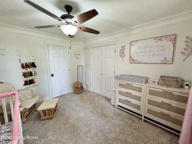 bedroom with carpet floors, a closet, ceiling fan, and ornamental molding