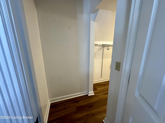 hallway featuring dark hardwood / wood-style floors