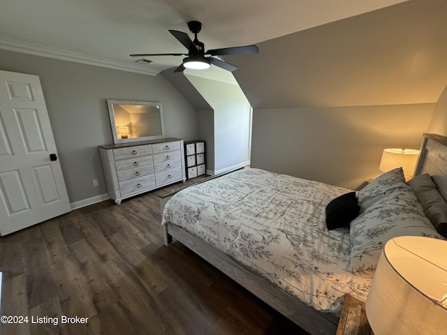 bedroom featuring ceiling fan, crown molding, dark wood-type flooring, and vaulted ceiling