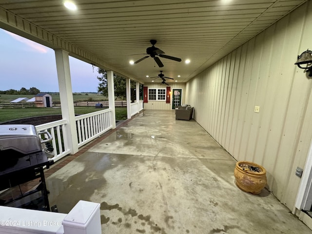 patio terrace at dusk with ceiling fan