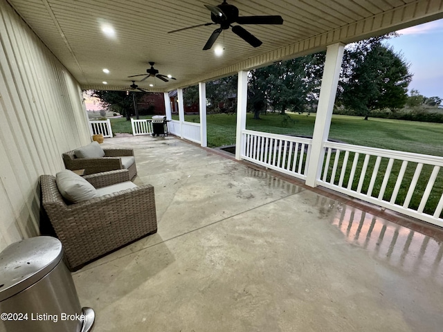 view of patio / terrace with ceiling fan, a grill, and covered porch