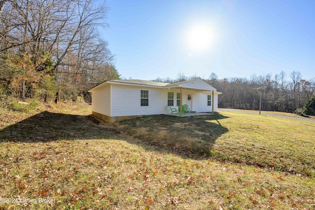 exterior space with a front lawn