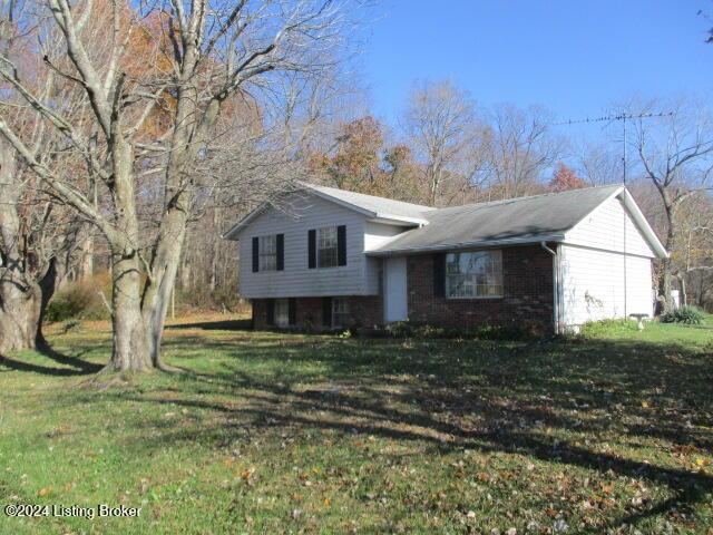 split level home with a front yard