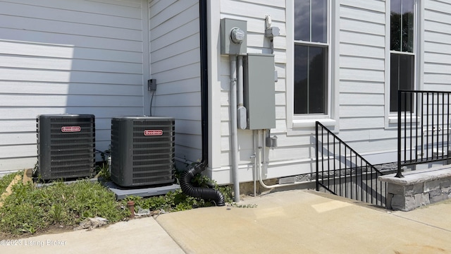 doorway to property featuring cooling unit