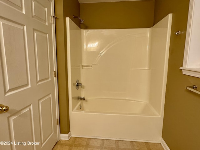 bathroom featuring  shower combination