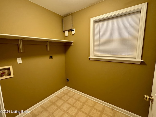 clothes washing area featuring hookup for an electric dryer and washer hookup