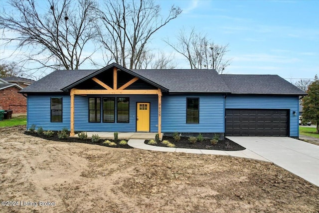 single story home featuring a porch and a garage