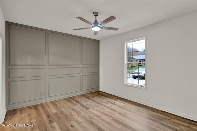 unfurnished bedroom with ceiling fan and light hardwood / wood-style floors