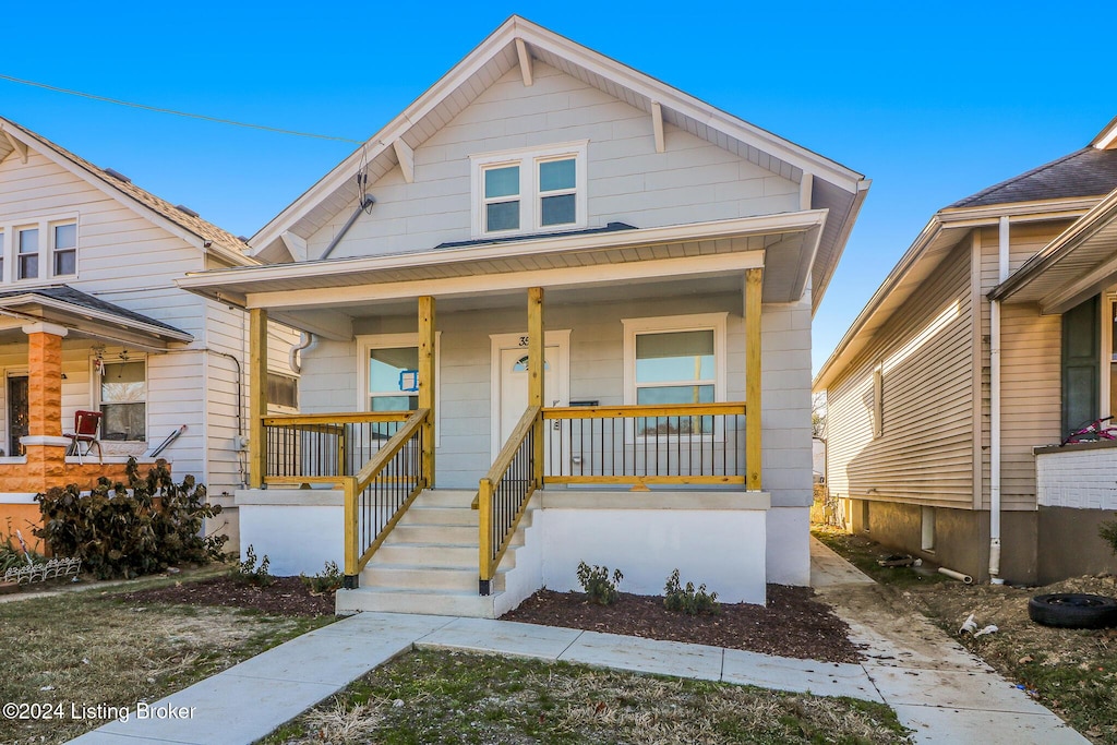 bungalow featuring covered porch