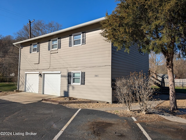 view of home's exterior with a garage