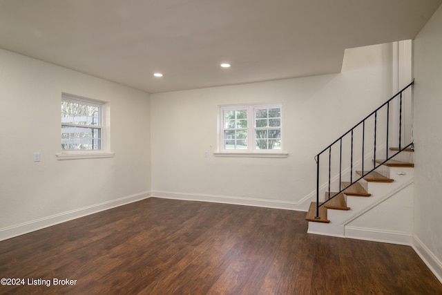 spare room featuring dark hardwood / wood-style flooring