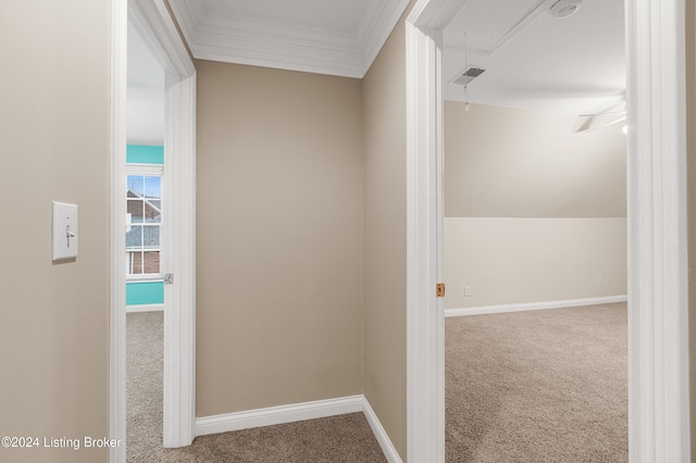 hall with crown molding and carpet floors