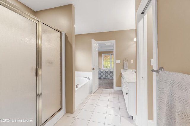 bathroom with shower with separate bathtub, vanity, tile patterned floors, and ornamental molding