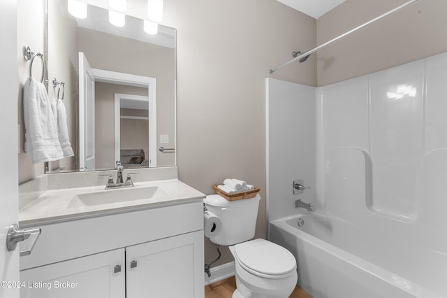 full bathroom featuring vanity, shower / bathtub combination, and toilet