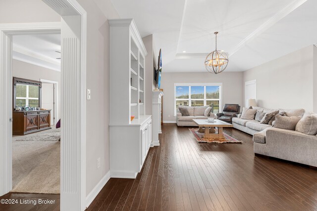 living room featuring dark wood-type flooring and an inviting chandelier