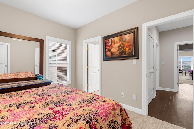 bedroom with wood-type flooring