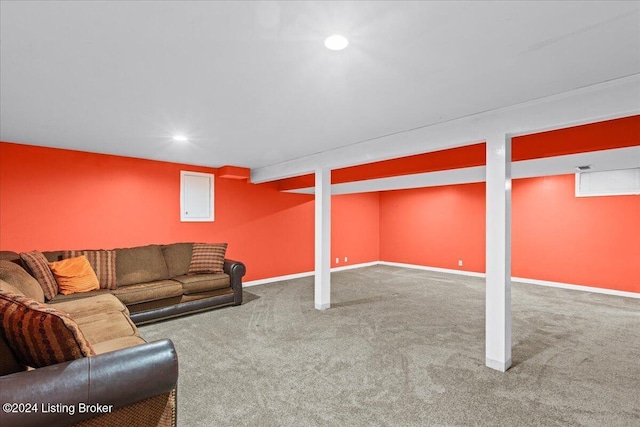 living area with baseboards, carpet, and recessed lighting