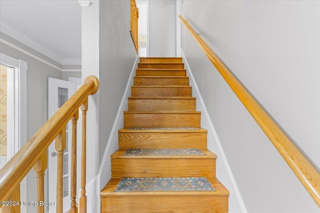 stairs featuring ornamental molding