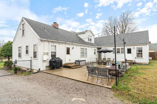 back of house featuring a patio