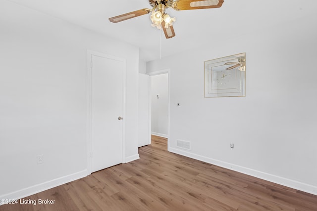 spare room with light wood-type flooring