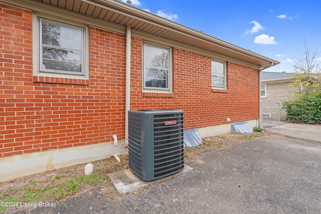 view of property exterior featuring central air condition unit