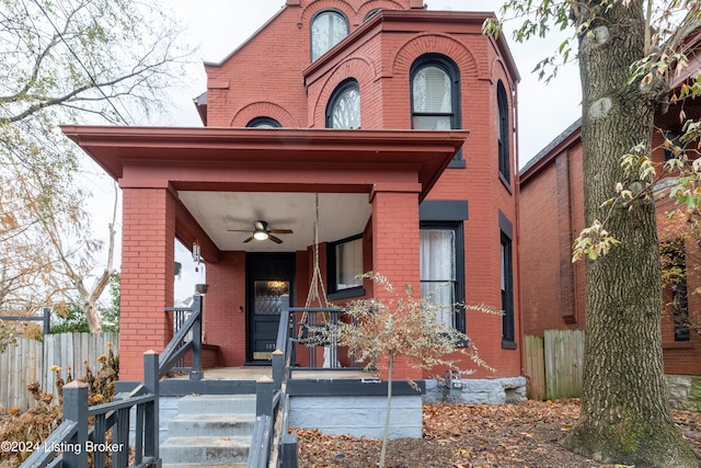 view of front facade featuring ceiling fan and covered porch