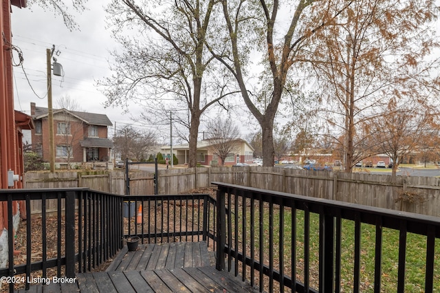 wooden deck with a yard